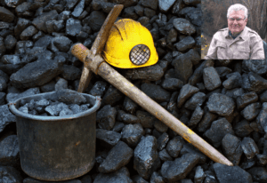 Miners hat and bucket of coal