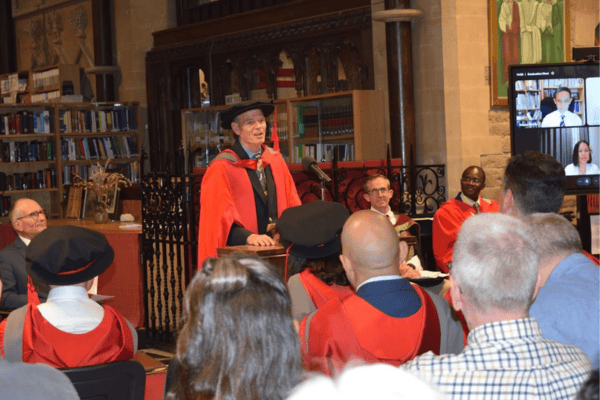Dr Brett Brewer giving the student response